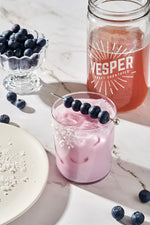 blueberry coconut margarita with garnish