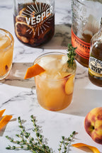 Vesper Bourbon Peach Smash cocktail infusion kit jar — lifestyle photo